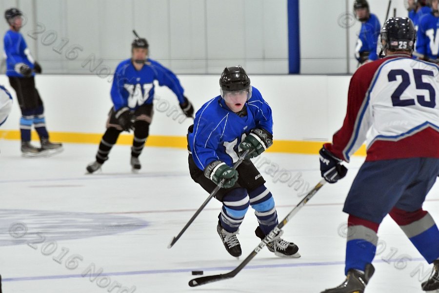 Wheaton College Men\'s Ice Hockey vs Middlesex Community College. - Photo By: KEITH NORDSTROM